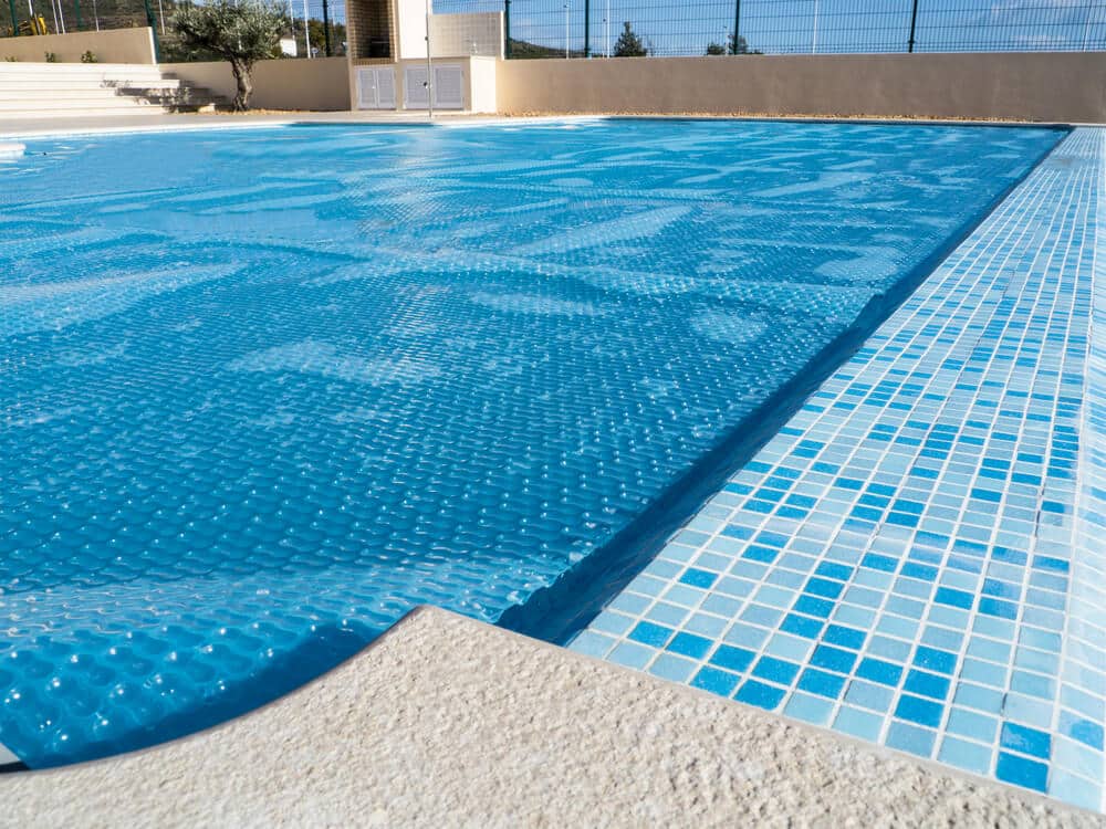 What Does a Pool Cover Actually Do? Pool Heating